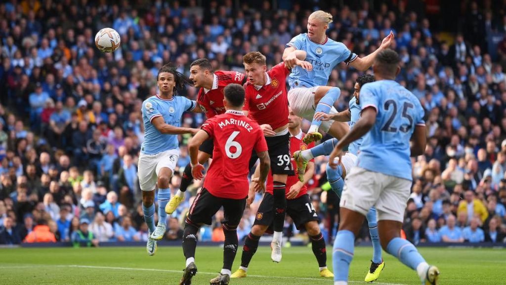 This image has an empty alt attribute; its file name is manchester-city-vs-manchester-united_169-1-1024x577.jpeg